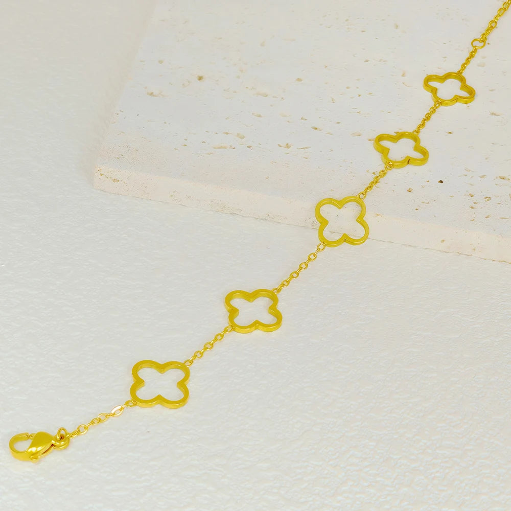 Stainless steel gold four-leaf clover nail bracelet, elegant, suitable for women's daily wear